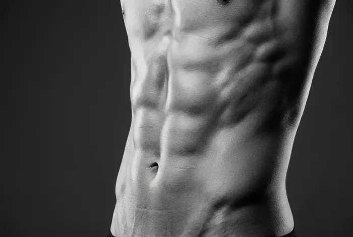 Gros plan minimaliste sur la structure des abdominaux